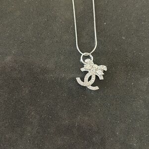 Authentic Chanel silver CC bow charm (chain sold separately!)